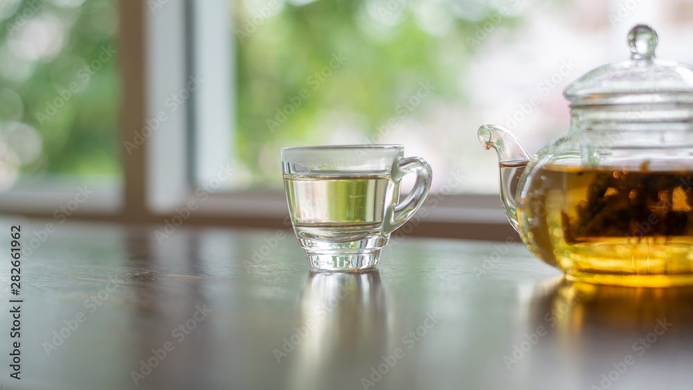hot tea on wood table, a cup of tea