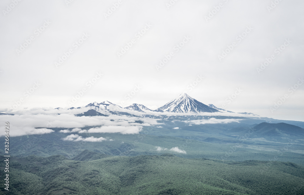 Fototapeta premium Avacha Volcanic Group: Avachinsky (also Avachinskaya Sopka) Koryaksky (also Koryakskaya), both designated a Decade Volcanoes due their history of explosive eruptions and proximity to populated areas.