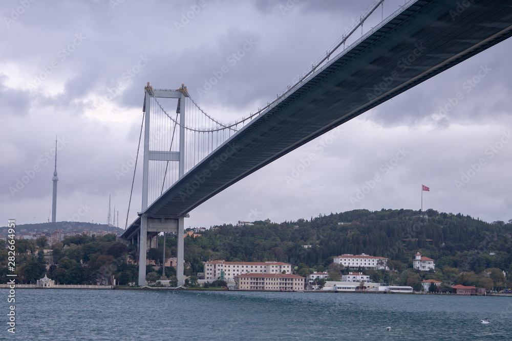Fatih Sultan Mehmet Bridge over Bosporus in cloudy day Strait, Istanbul, Turkey