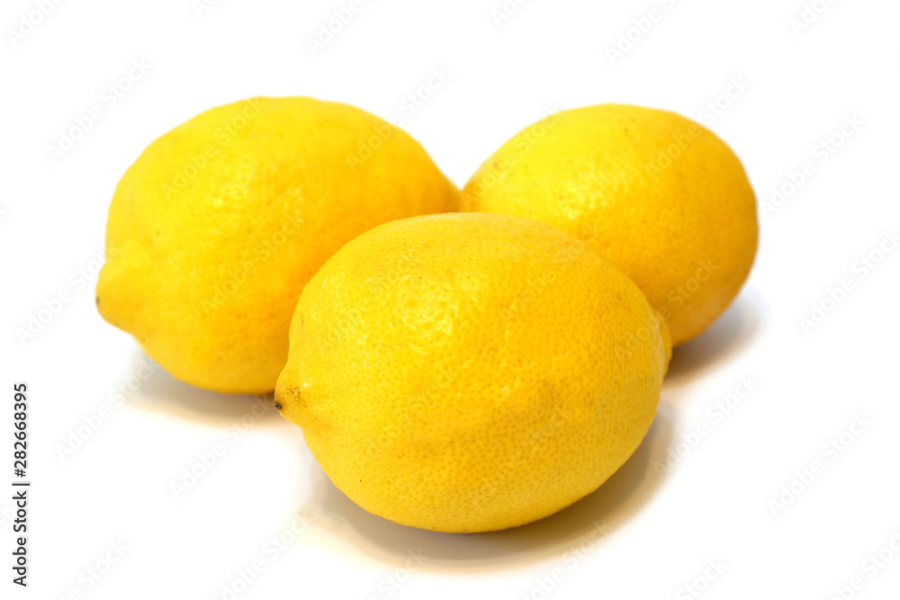 Fresh juicy lemons on white background isolated closeup Fresh juicy lemons on white background isolated closeup