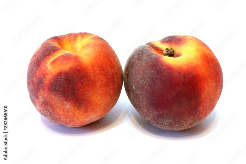 Juicy fresh peaches on white background close up isolated Juicy fresh peaches on white background close up isolated