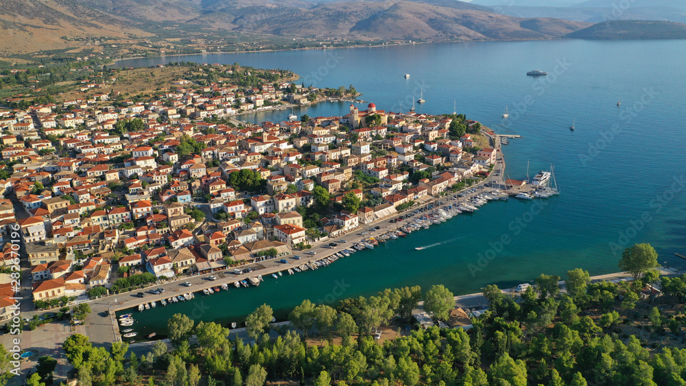 Fototapeta premium Aerial drone photo from picturesque seaside fishing village and port of historic Galaxidi, Fokida, Greece