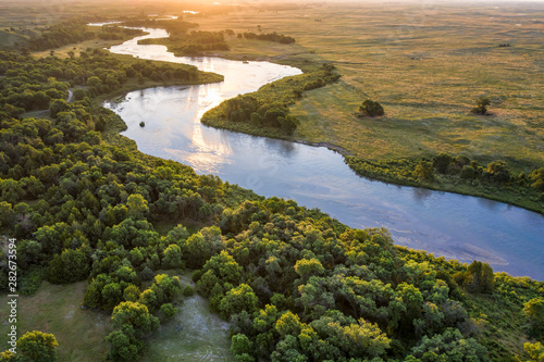 sunrise over Dismal River in  Nebraska Sandhills