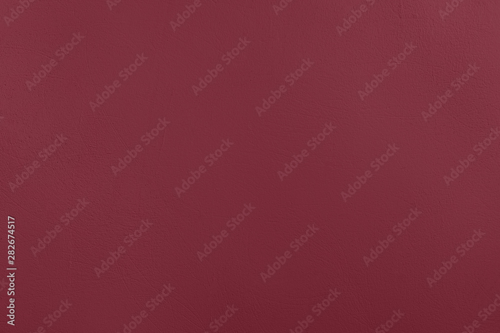 Dark red Concrete textured background to your concept or product. Winter 2020 color trend. Dark red Concrete textured background to your concept or product. Winter 2020 color trend.