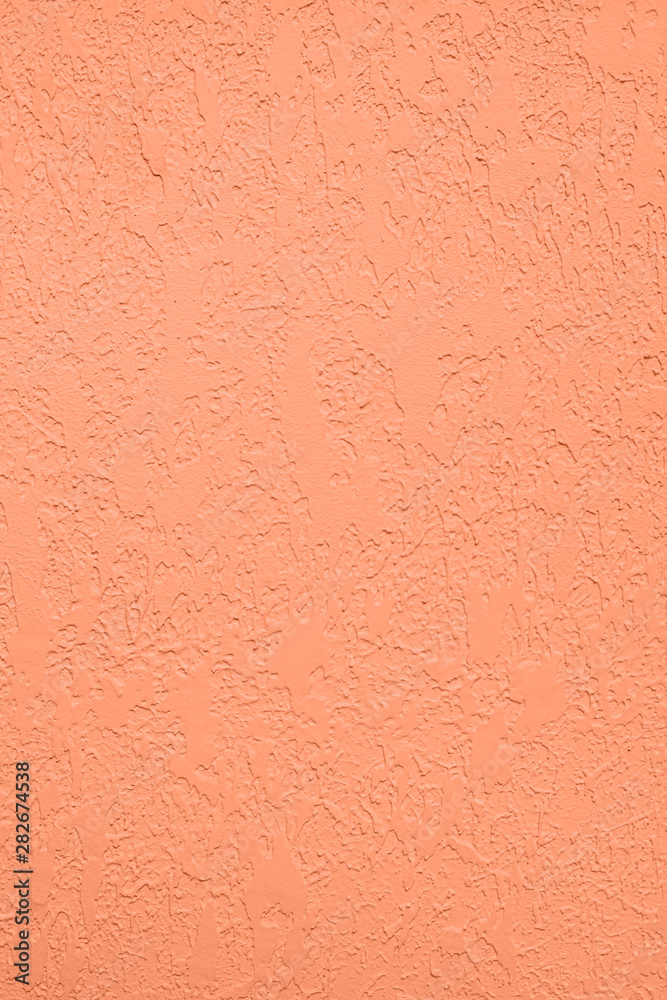 Light orange colored low contrast Concrete textured background with