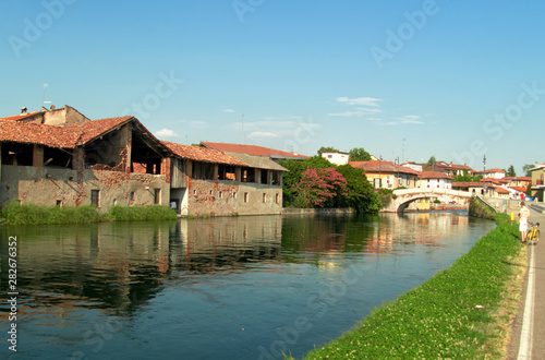 walk along the Naviglio Grande in the agricultural villages near Milan, Italy