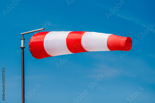 Windsock indicator of wind on runway airport photo