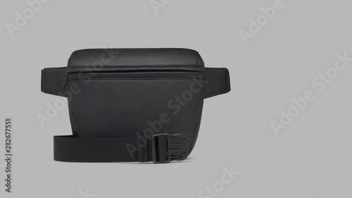 Black isolate bumbag on gray background photo