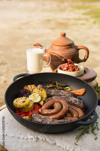Grilled meat sausages with ...
