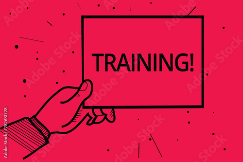 Conceptual hand writing showing Training. Business photo text An activity occurred when starting a new job project or work Man holding paper communicating information dotted red background photo