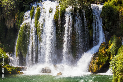 Kravice waterfall on the Trebizat River in Bosnia and Herzegovina.  Miracle of Nature in Bosnia and Herzegovina. The Kravice waterfalls  originally known as the Kravica waterfalls