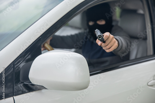 man face mask with hand gun