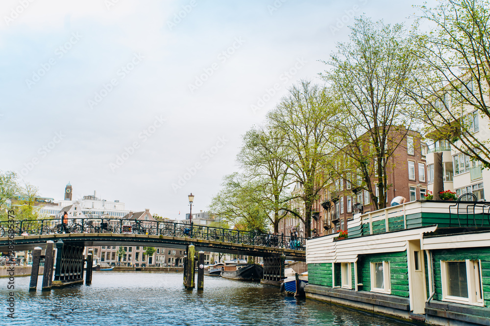 Naklejka premium Amsterdam, Netherlands September 5, 2017: canals and rivers. City landscape. Tourist place. Sights.