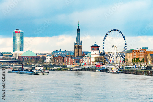 Photography GERMANY, DUSSELDORF - NOVEMBER 28,2017: Beautiful shore of Rhine river during da