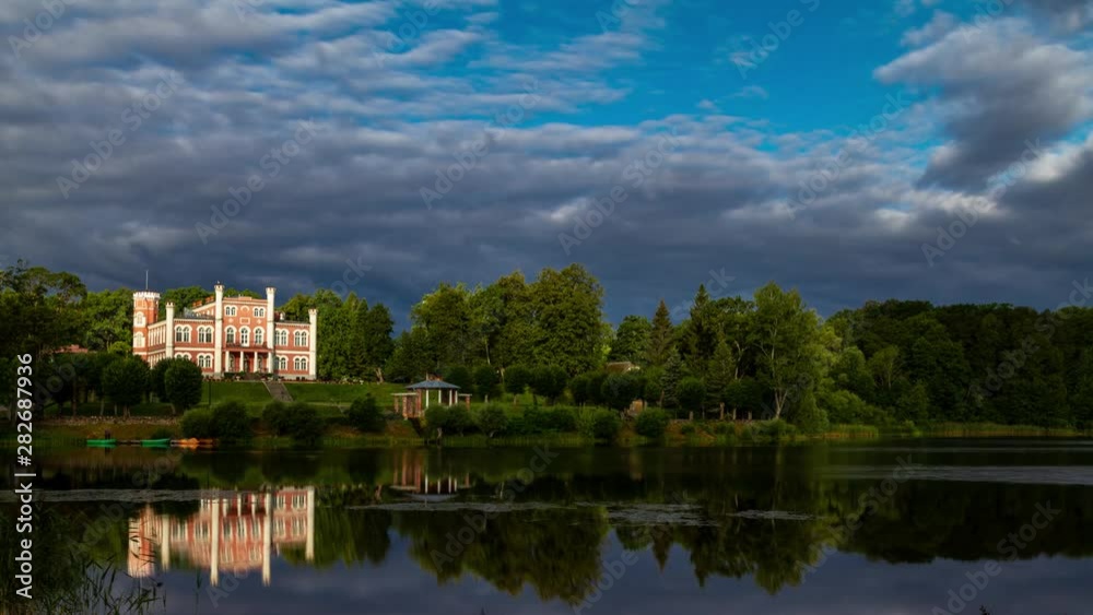 Time lapse of beautiful reflection of Birini palace in Vidzeme region, Latvia Time lapse of beautiful reflection of Birini palace in Vidzeme region, Latvia