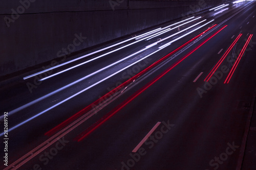 Wallpaper Mural  headlights of cars on the road in the city in the dark. Torontodigital.ca