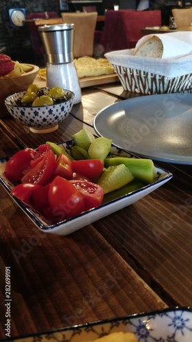 Tomato plate cucumber snack olive vegetables