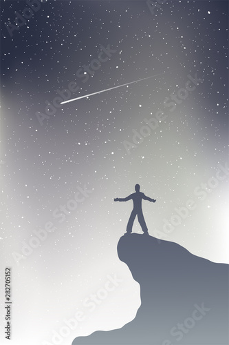 man in mountain watching shooting stars