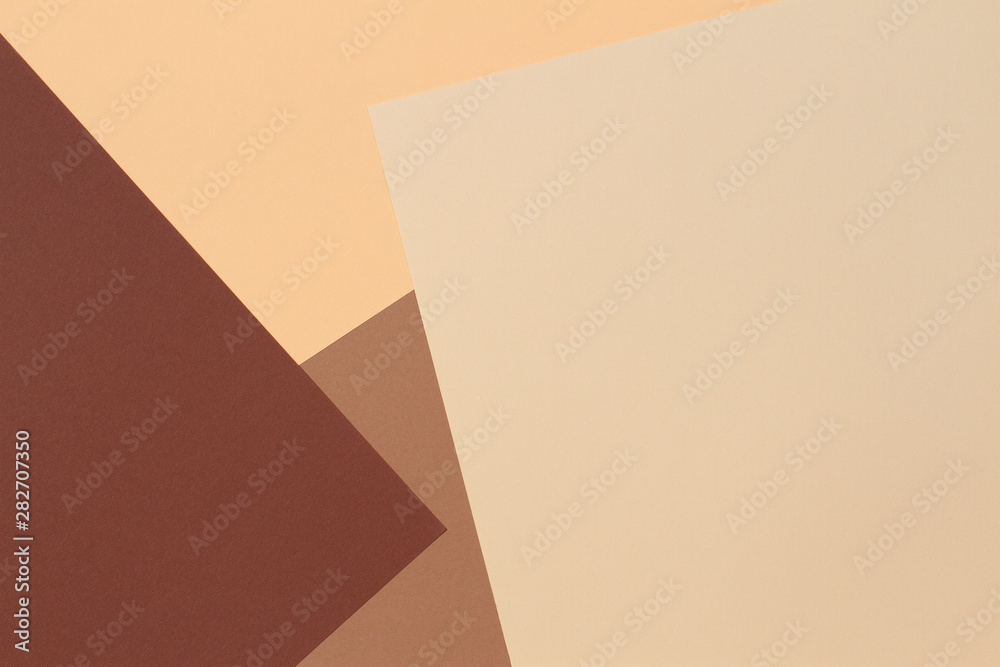 Color papers geometry composition banner background with beige, light brown and dark brown tones. Color papers geometry composition banner background with beige, light brown and dark brown tones.