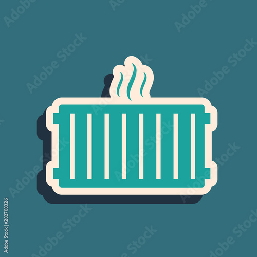 Green Heating radiator icon isolated on blue background. Long shadow style. Vector Illustration