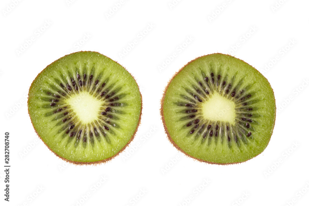 two kiwi halves isolated on white background two kiwi halves isolated on white background