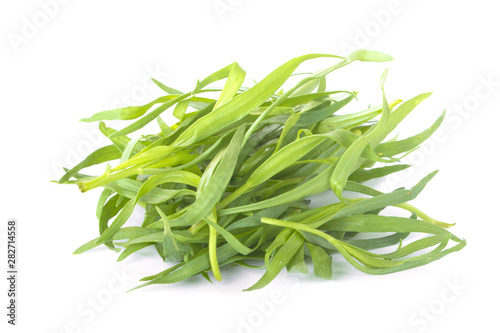 heap of tarragon leaves isolated on white background