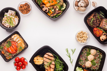 Frame of healthy food in black boxes with blank space on white