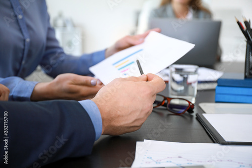Businessman with document d...