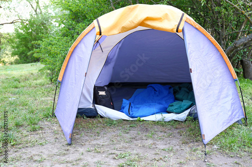 Konstfotografi Camping tent in forest on summer day