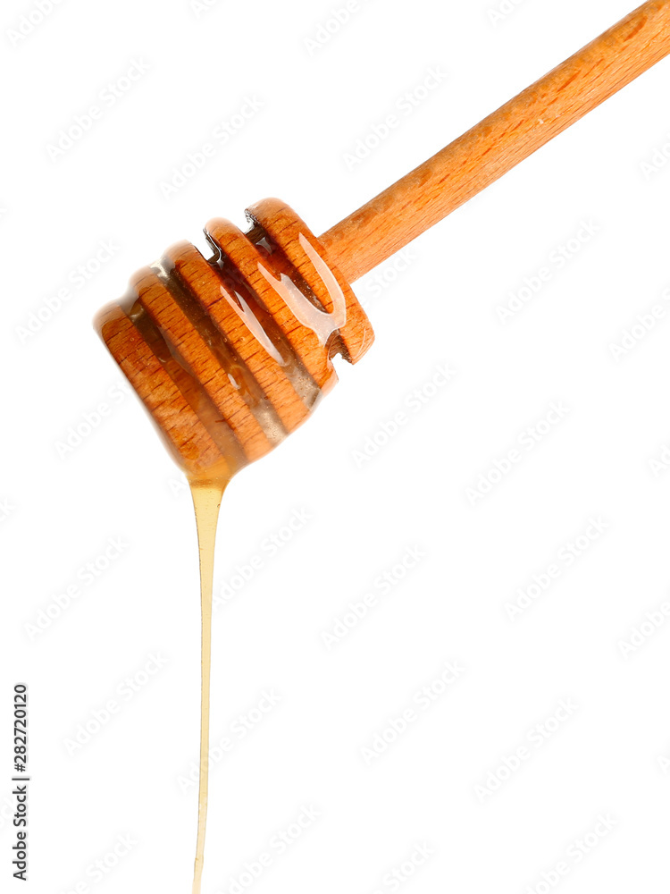 Wooden honey dipper on white background Wooden honey dipper on white background
