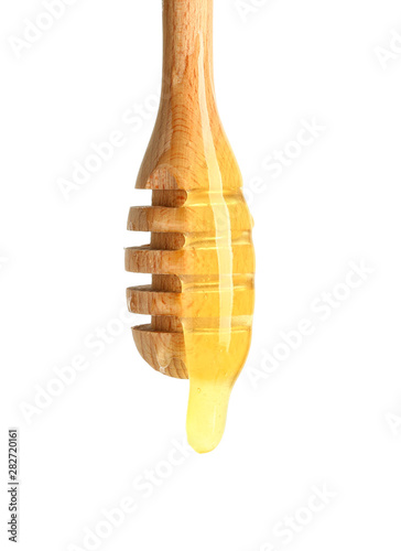 Golden honey dripping from ...