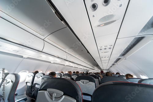 Foto Airplane air conditioning control panel over seats
