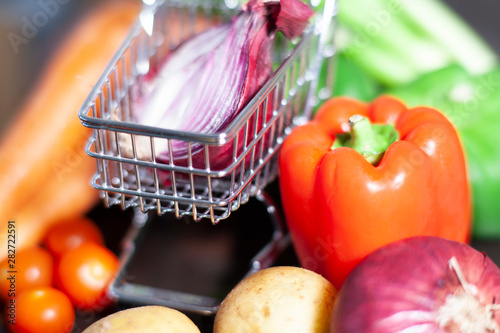 Big vegan shopping for huge vegetables photo