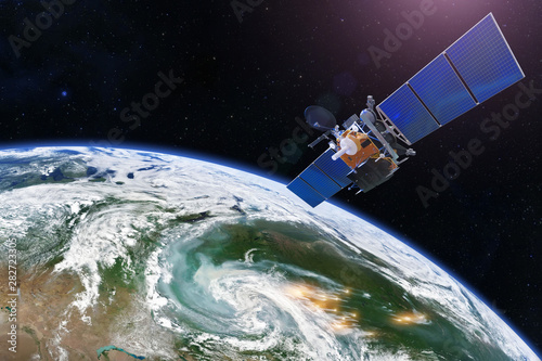Fototapeta Naklejka Na Ścianę i Meble -  Satellite above the Earth measurements. Sensing, research, probing, monitoring of foci forest fires marked by outbreaks, smoke spreads over large areas. Elements of this image furnished by NASA.