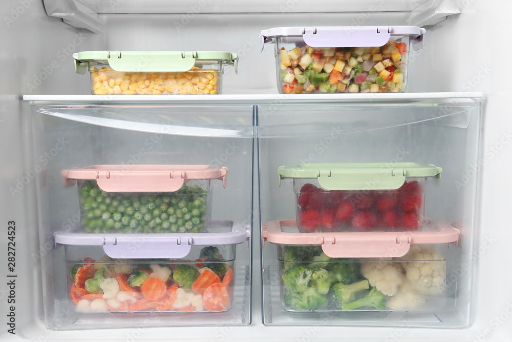 Boxes with different products inside of refrigerator Boxes with different products inside of refrigerator