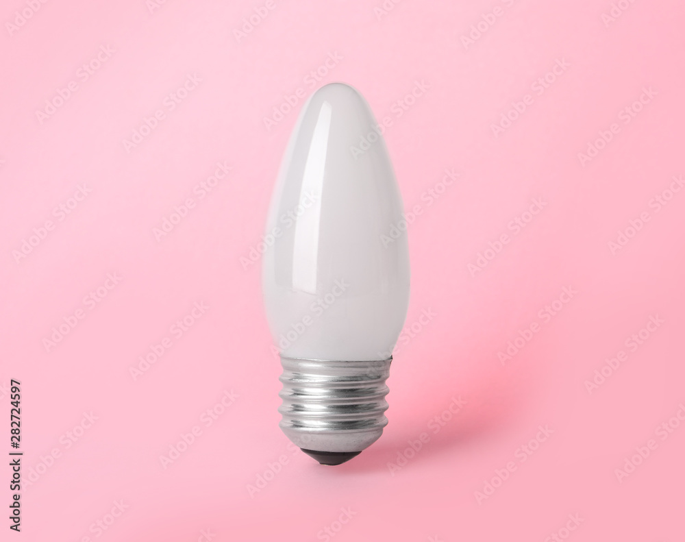 New modern lamp bulb on pink background New modern lamp bulb on pink background