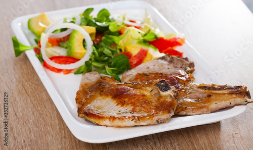 Fried pork loin with salad