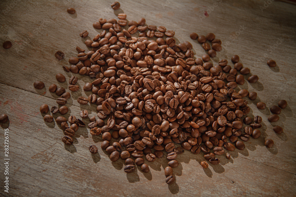 coffee beans wooden table coffee beans wooden table