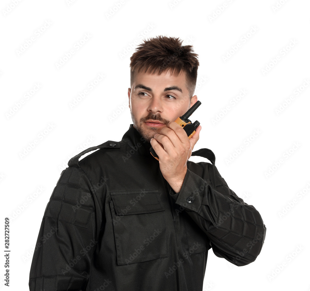 Male security guard in uniform using portable radio transmitter on white background Male security guard in uniform using portable radio transmitter on white background