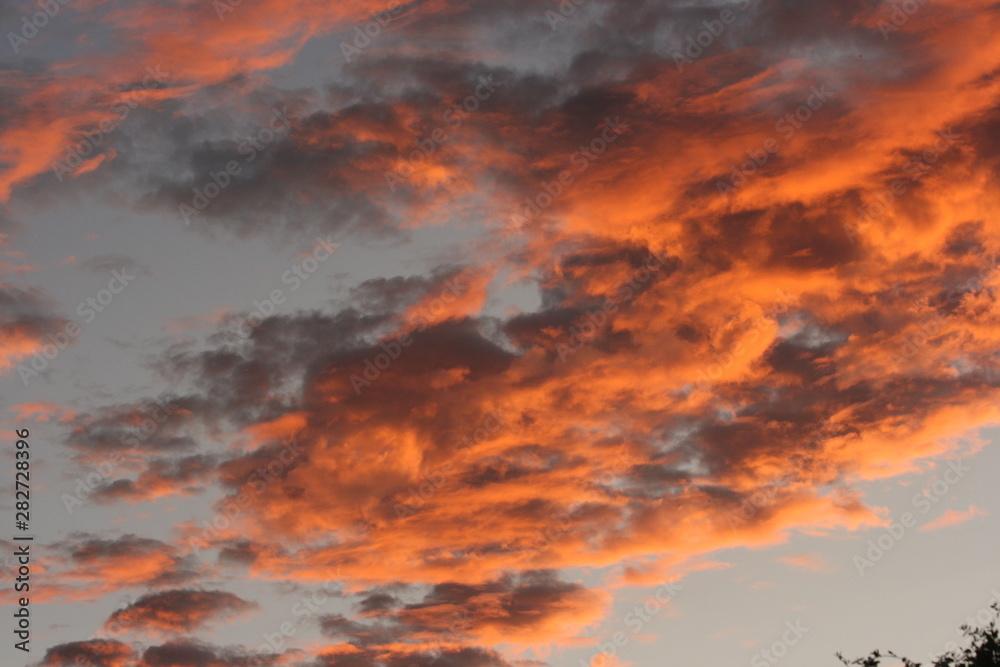 sunset at summer in a cloudy sky sunset at summer in a cloudy sky