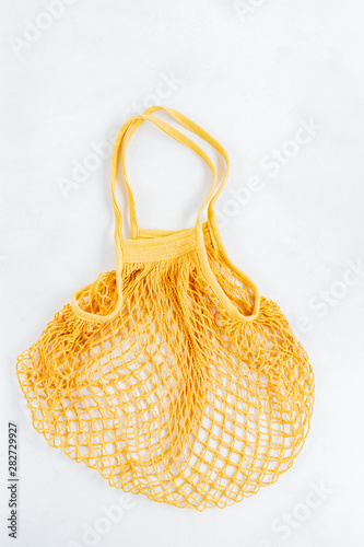 Mesh bag on a white background..Zero waste shopping concept.