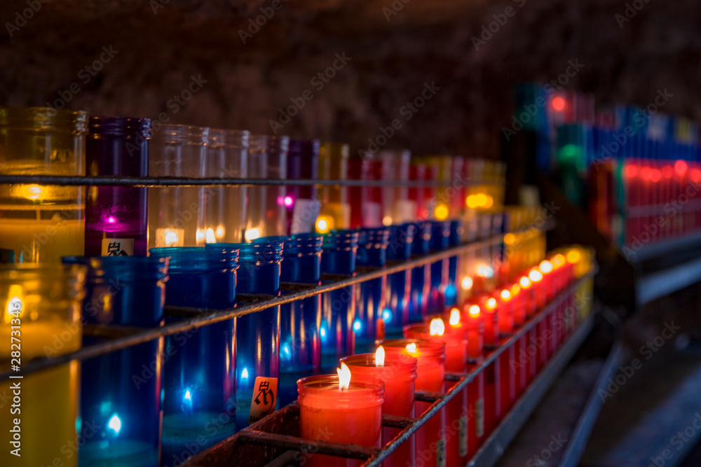 Rows of candles in Catholic church