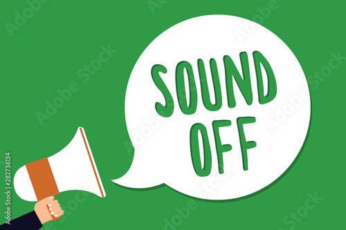 Conceptual hand writing showing Sound Off. Business photo showcasing To not hear any kind of sensation produced by stimulation Man holding megaphone loudspeaker screaming green background photo