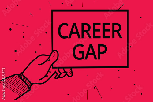 Conceptual hand writing showing Career Gap. Business photo text A scene where in you stop working by your profession for a while Man holding paper communicating information dotted red background photo