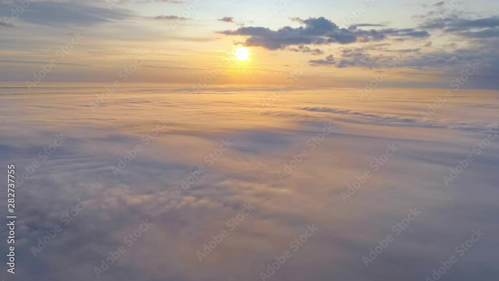 Flight above the clouds