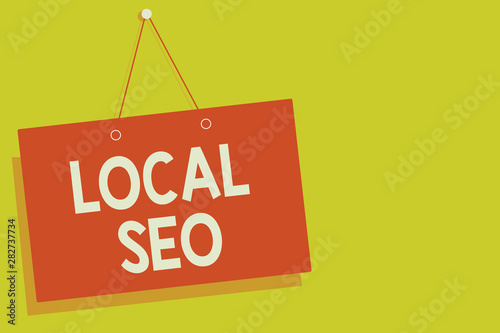 Handwriting text Local Seo. Concept meaning This is an effective way of marketing your business online Red board wall message communication open close sign yellow background photo