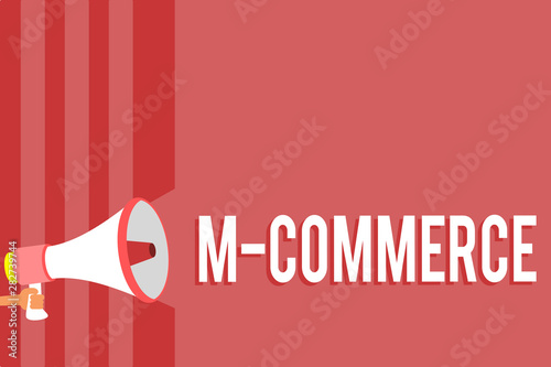 Word writing text M Commerce. Business concept for commercial transactions conducted electronically by mobile phone Megaphone loudspeaker red stripes important message speaking out loud photo