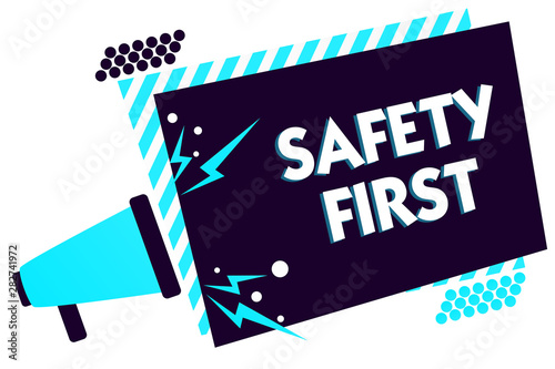 Handwriting text Safety First. Concept meaning Avoid any unnecessary risk Live Safely Be Careful Pay attention Megaphone loudspeaker blue striped frame important message speaking loud