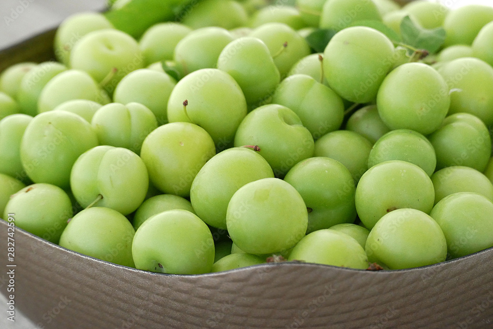 close-up of green sour plums, fresh green plums, close-up of green sour plums, fresh green plums,