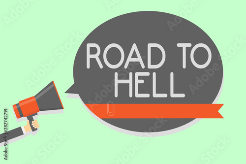 Conceptual hand writing showing Road To Hell. Business photo showcasing Extremely dangerous passageway Dark Risky Unsafe travel Man holding megaphone loudspeaker speech bubble message loud
